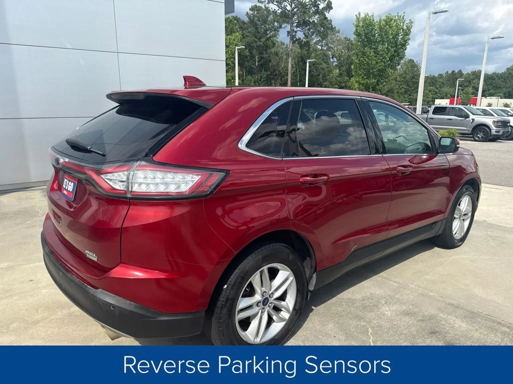 Used 2016 Ruby Red Metallic Tinted Clearcoat Ford SEL image 6