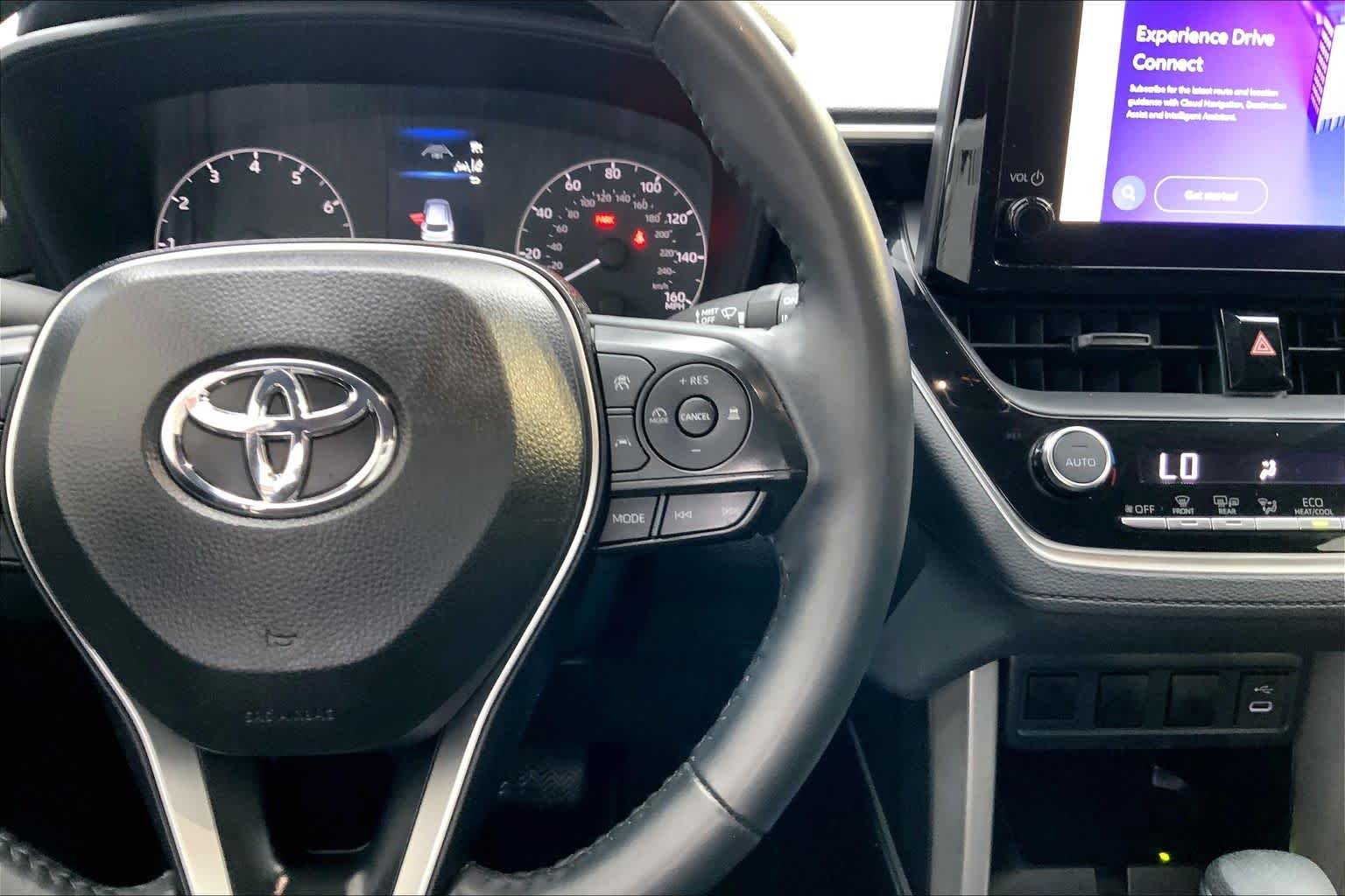Used 2024 Blue Crush Metallic Toyota LE image 25