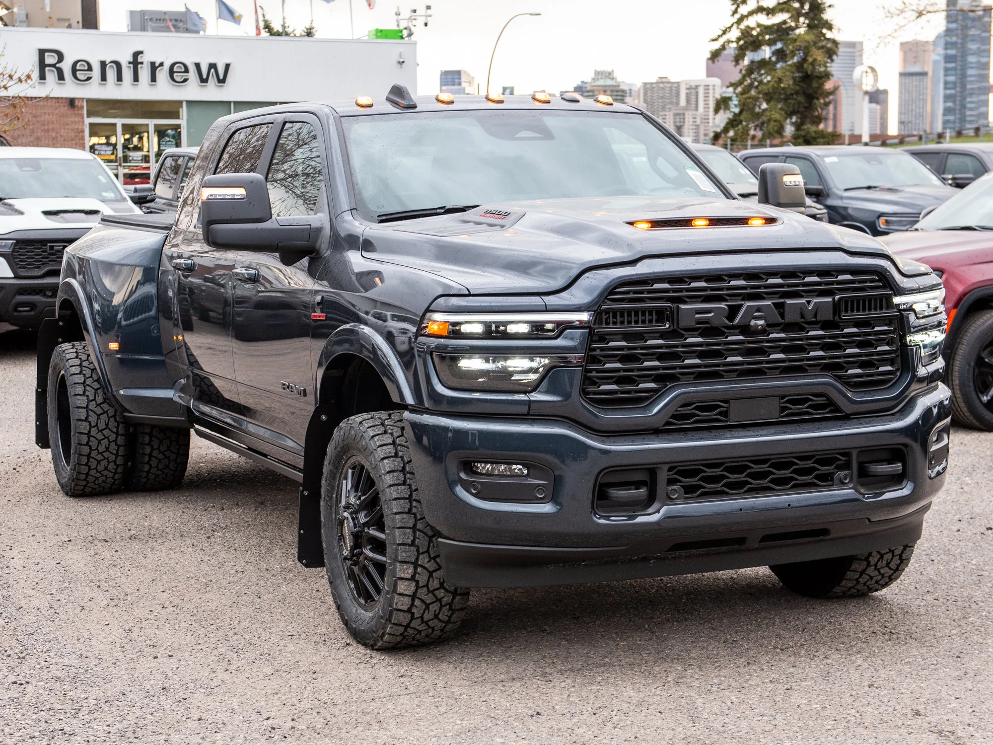 Used 2026 Blue RAM Limited* Mega Cab, 20 Inch Mayhem Wheels, Trigger Industries Mudflaps image 11