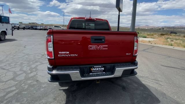 Used 2016 COPPER RED METALLIC GMC 4WD SLT image 7