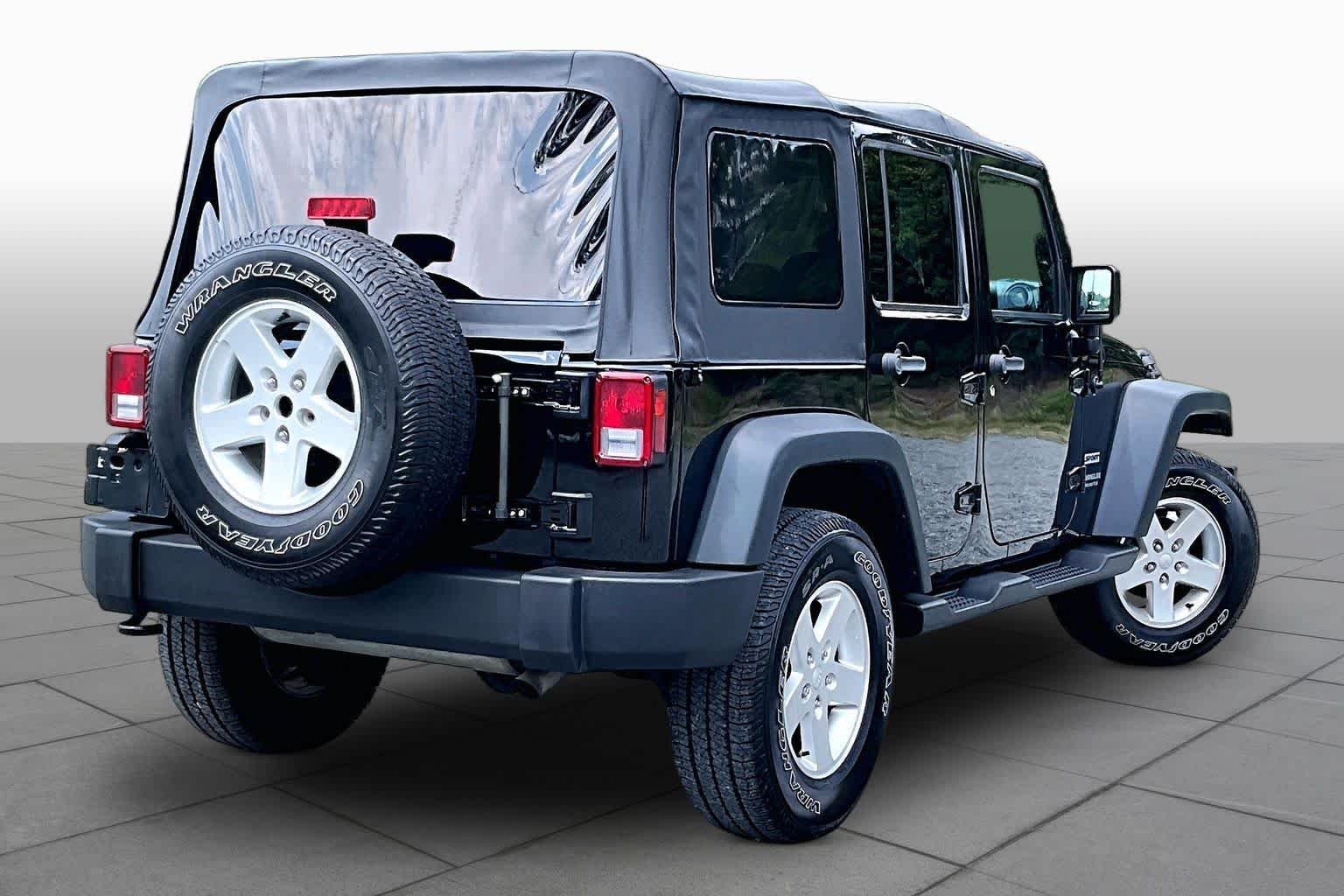 Used 2016 Black Clearcoat Jeep Sport image 13