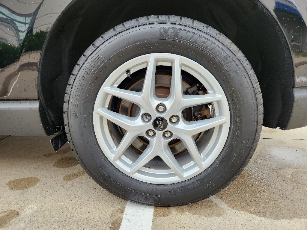 Used 2024 Agate Black Metallic Ford SEL image 23