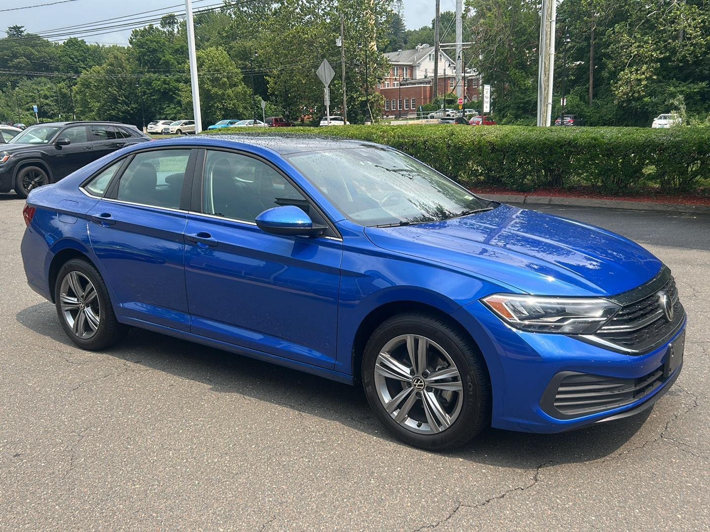 Used 2023 Rising Blue Metallic Volkswagen SE image 6