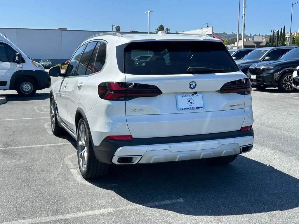 New 2026 Mineral White Metallic BMW xDrive50e image 3