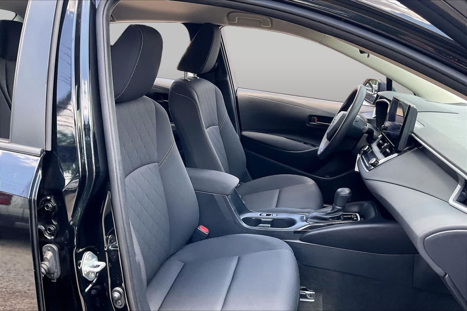 Used 2025 Midnight Black Metallic Toyota Hybrid LE image 9