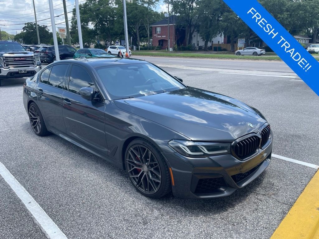 Used 2022 Gray BMW M550i xDrive image 1