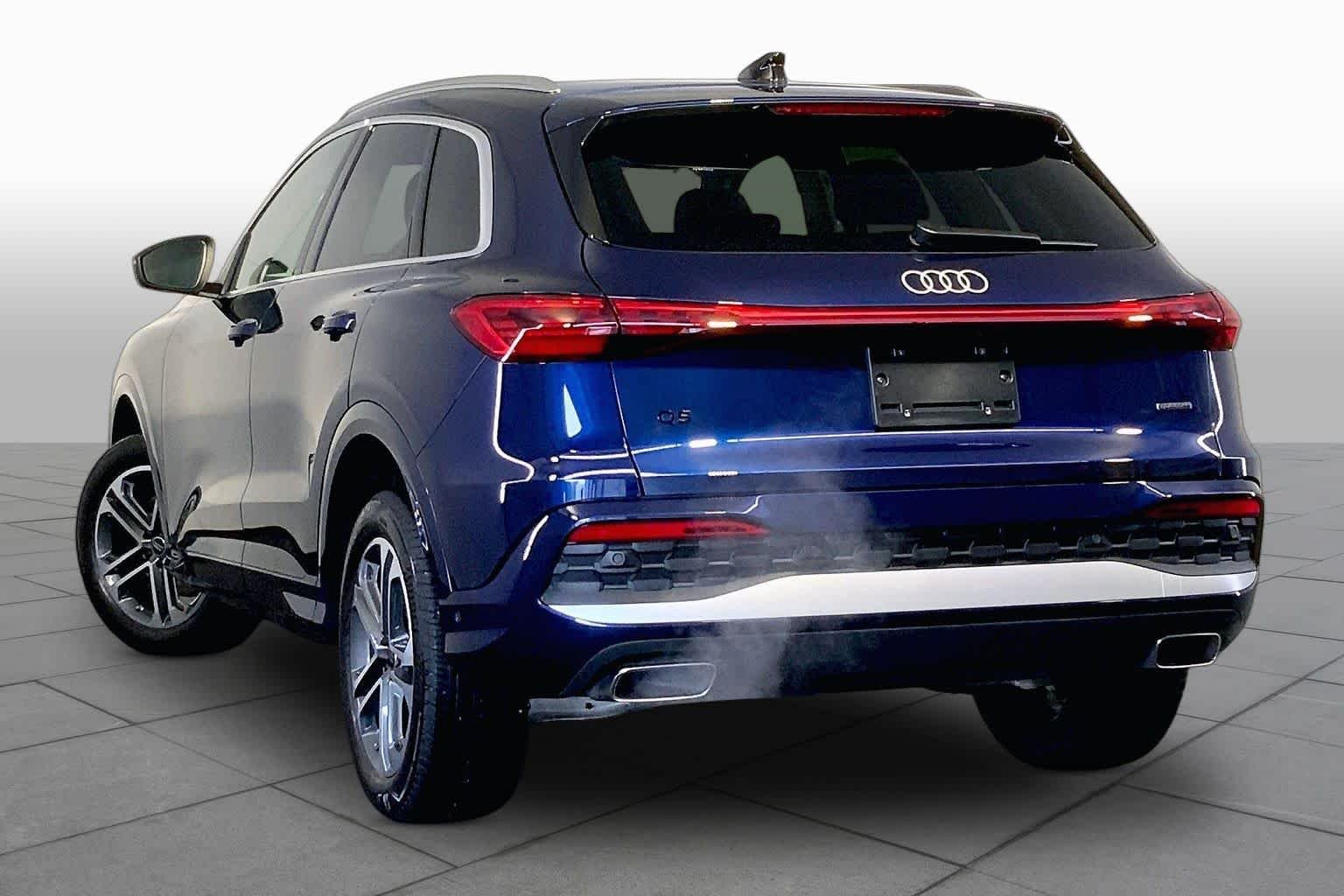 Used 2025 Navarra Blue Metallic Audi Premium image 12