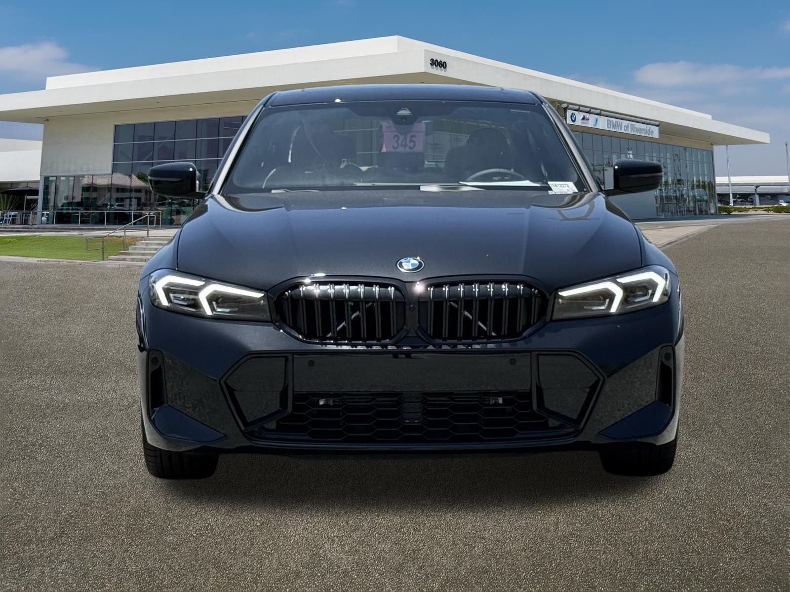 New 2026 Black Sapphire Metallic BMW 330i image 3