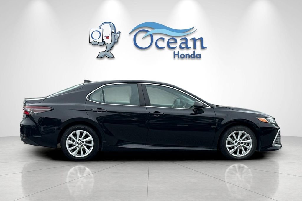 Used 2023 Midnight Black Metallic Toyota LE image 3