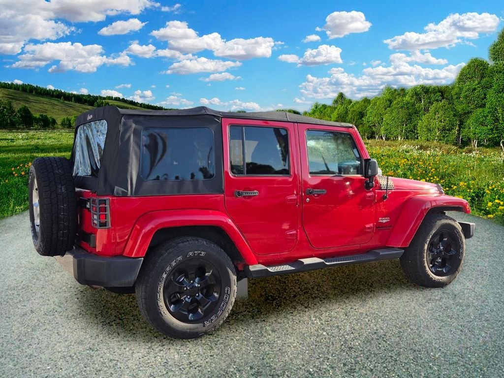 Used 2015 Red Jeep Unlimited Sahara image 6