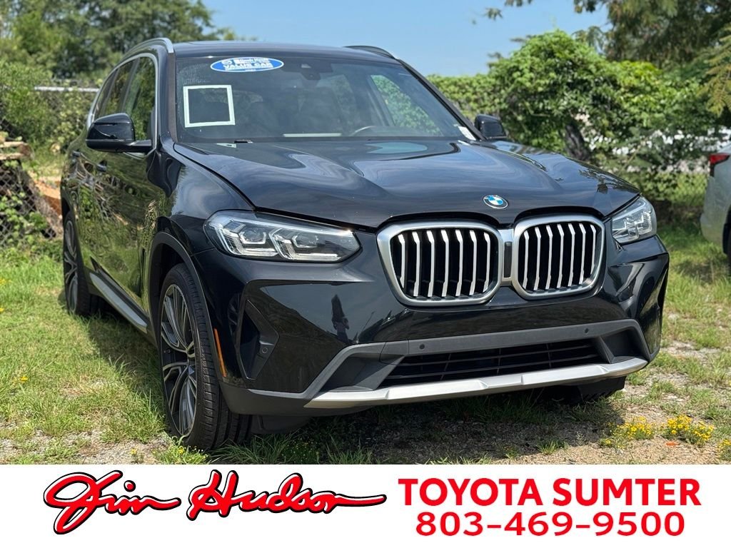Used 2022 Black BMW sDrive30i image 1