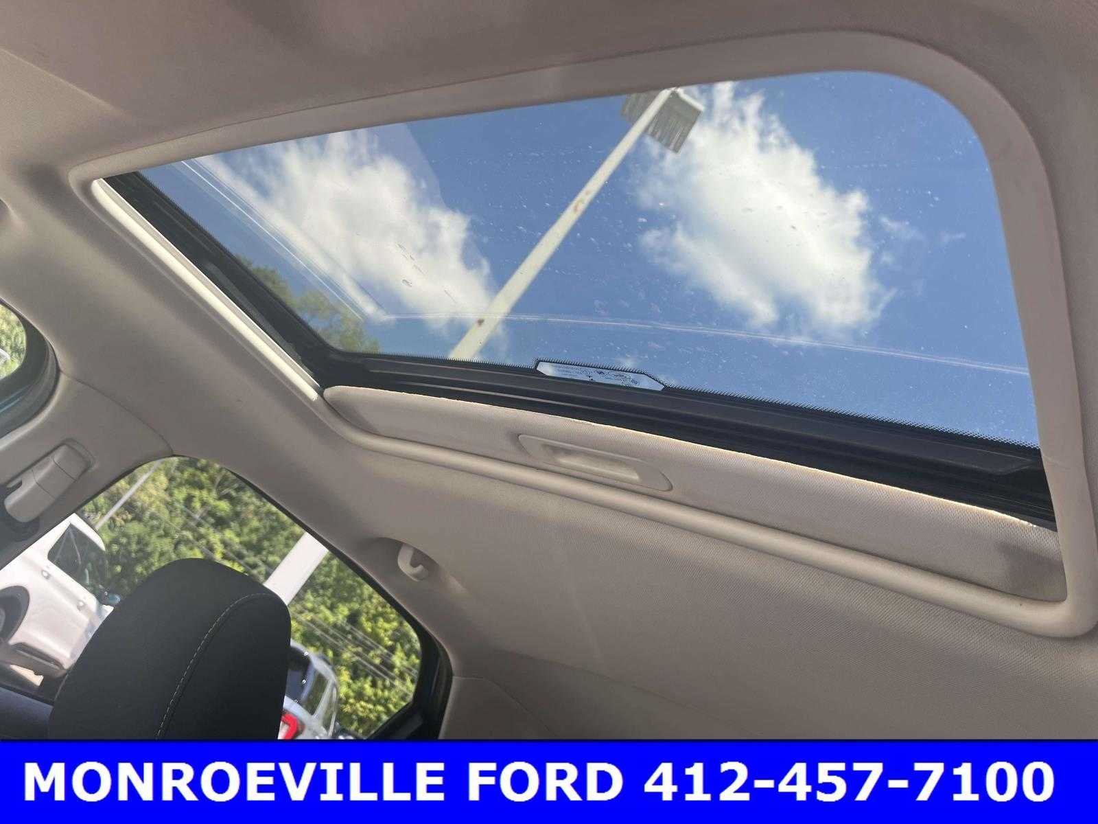 Used 2019 Blue Candy Metallic Tinted Clearcoat Ford SE image 10