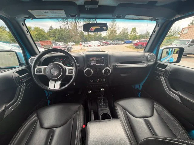 Used 2017 Blue Jeep Unlimited Sahara image 16