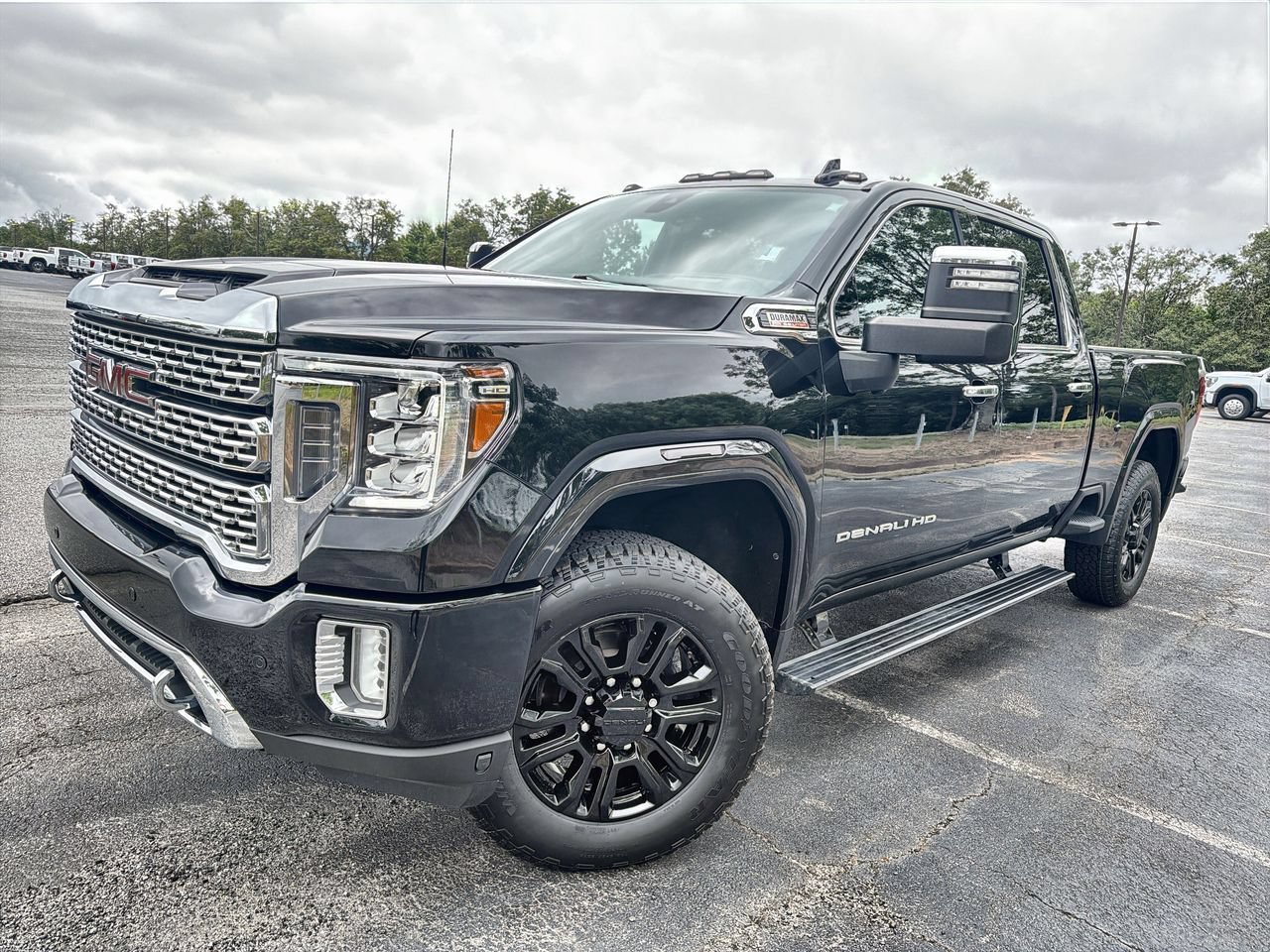 Used 2021 EBONY TWILIGHT METALLIC GMC Denali image 1