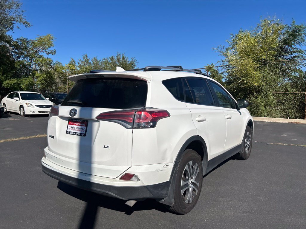 Used 2016 Super White Toyota LE image 6