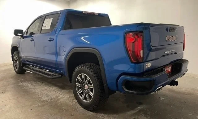 Used 2024 Dynamic Blue Metallic GMC AT4 image 6