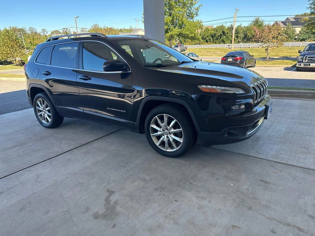 Used 2014 Brilliant Black Crystal Pearlcoat Jeep FWD 4dr Limited image 1