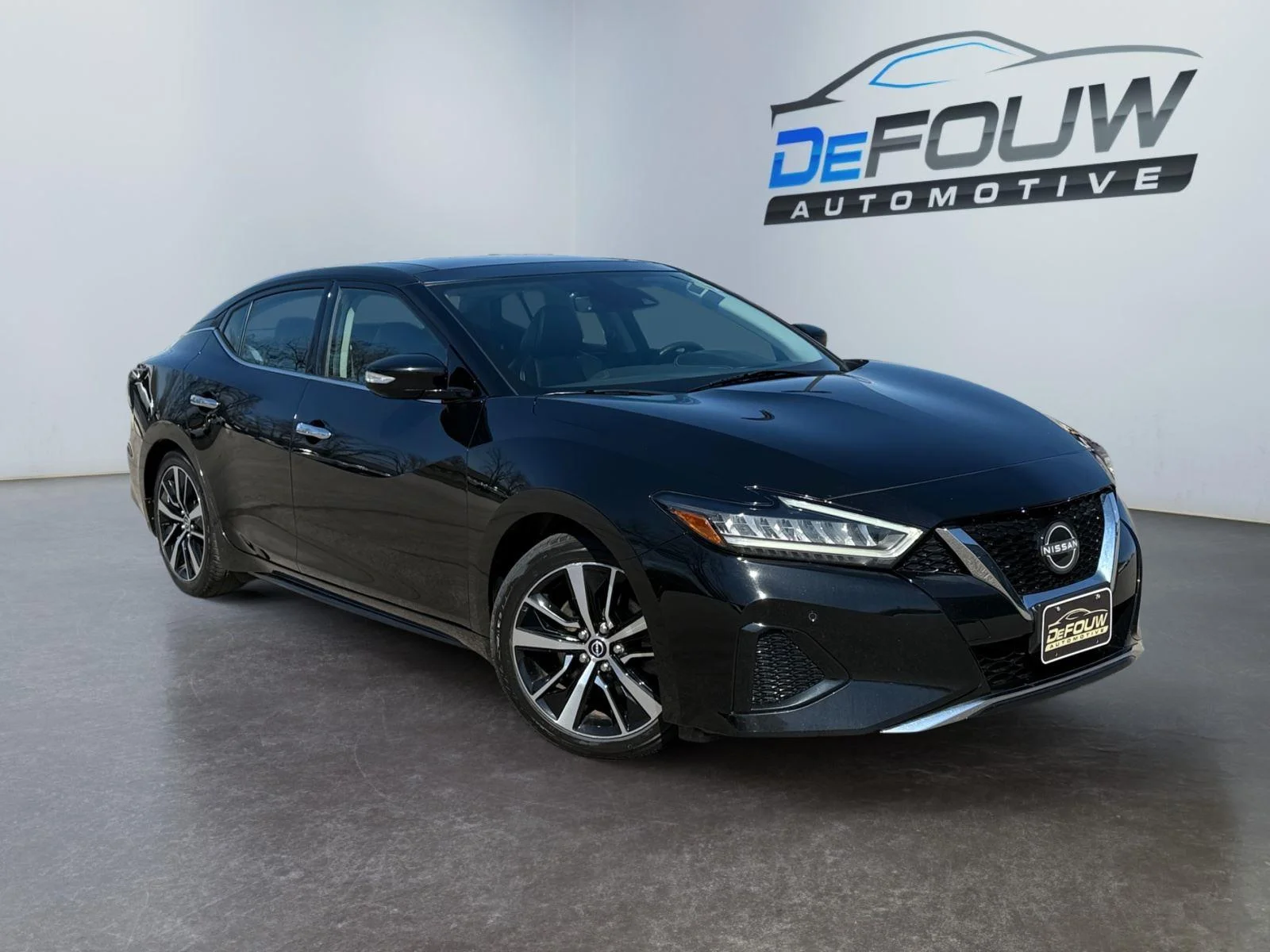 Used 2023 BLACK NISSAN SL SEDAN image 1
