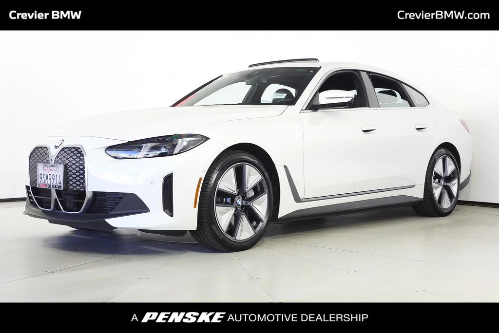 Used 2025 White BMW eDrive40 image 1