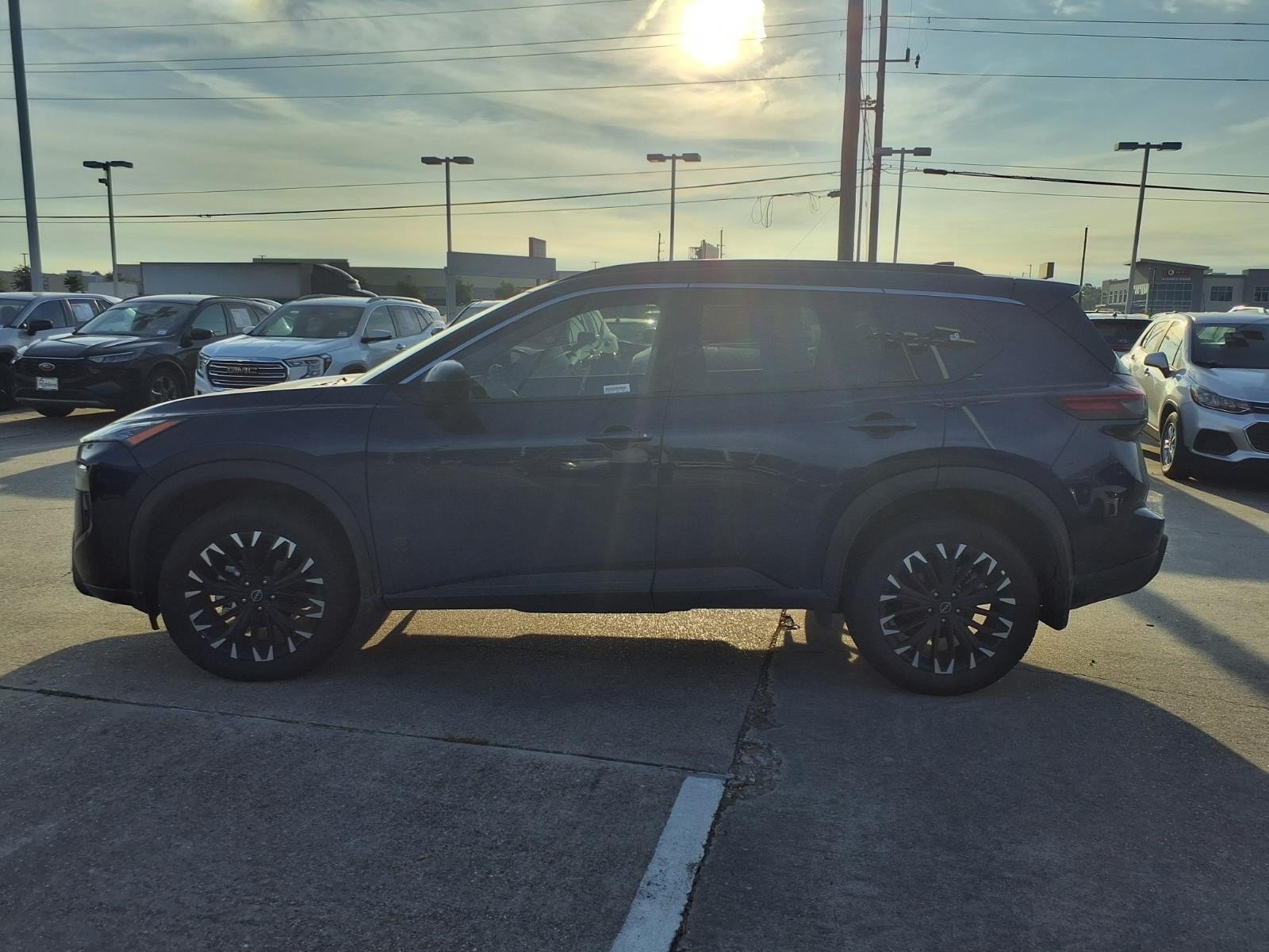 Certified Used 2026 Deep Ocean Blue Pearl Nissan Dark Armor image 9