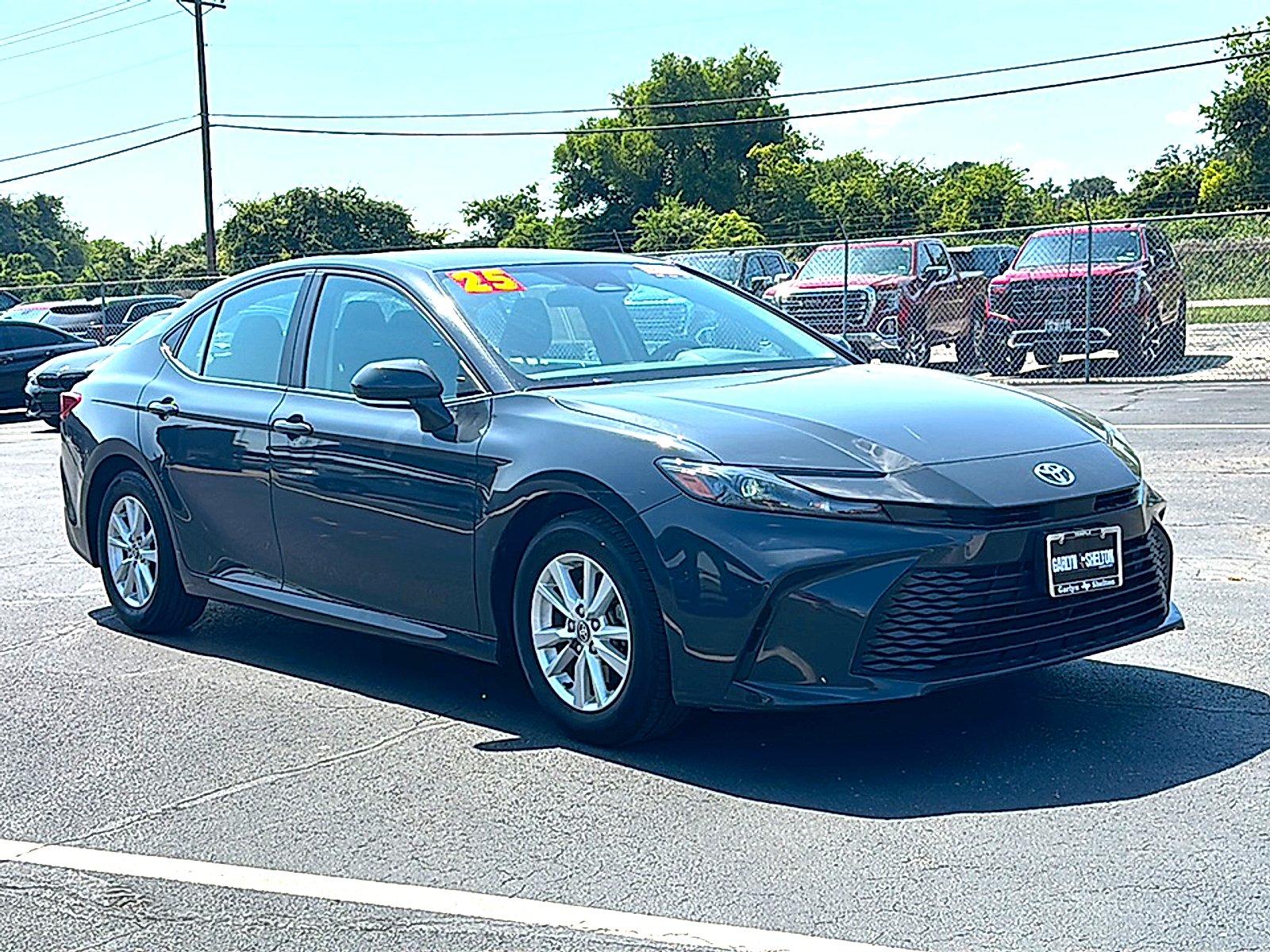 Used 2025 Super Black Toyota LE image 10