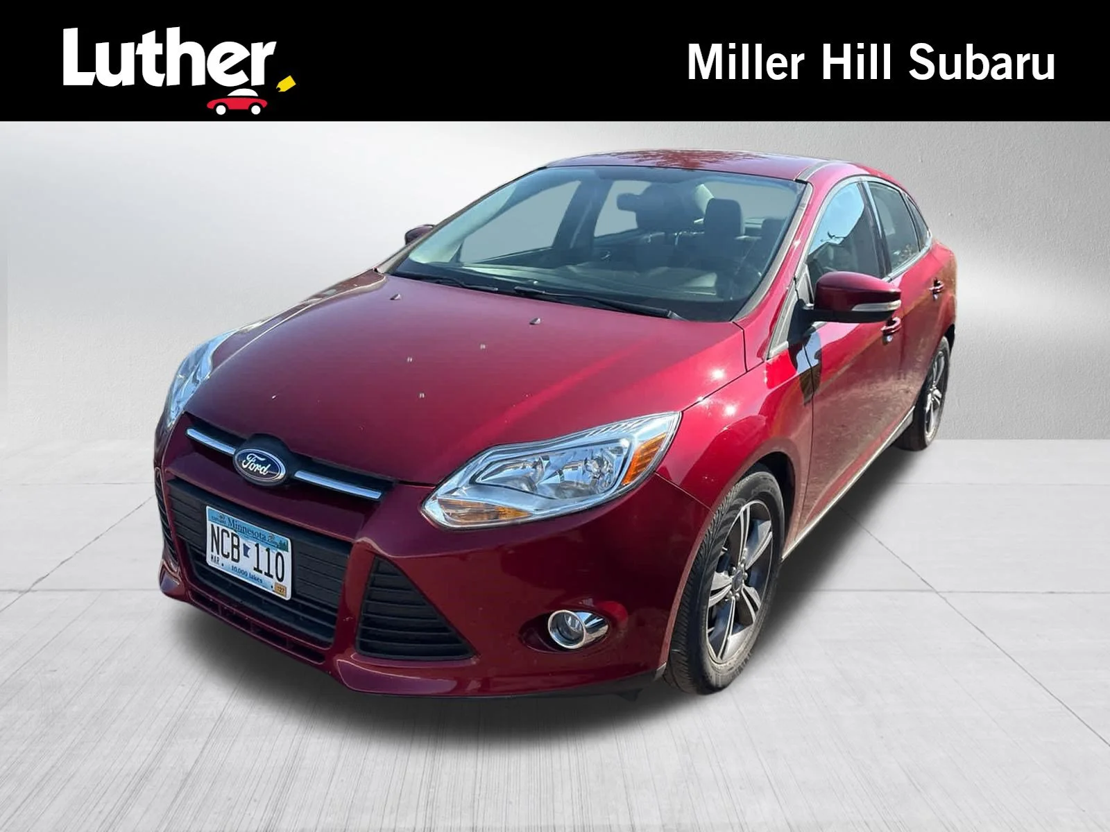 Used 2014 Ruby Red Tinted Clearcoat Ford SE image 1