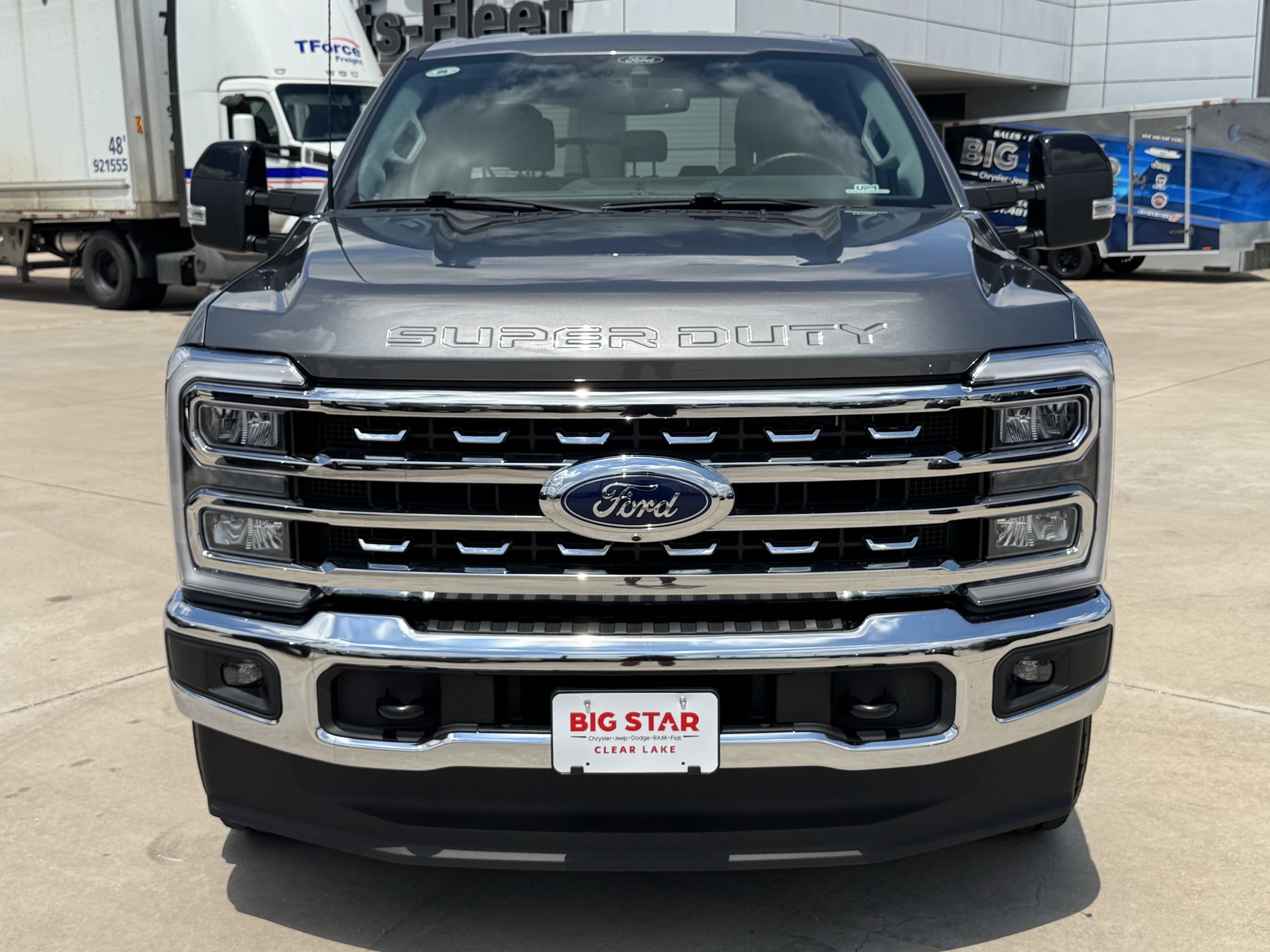 Used 2025 Gray Metallic Ford LARIAT 4WD Crew Cab 6.75