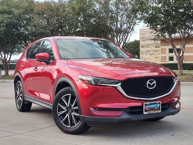 Used 2017 Red Mazda Grand Select image 1