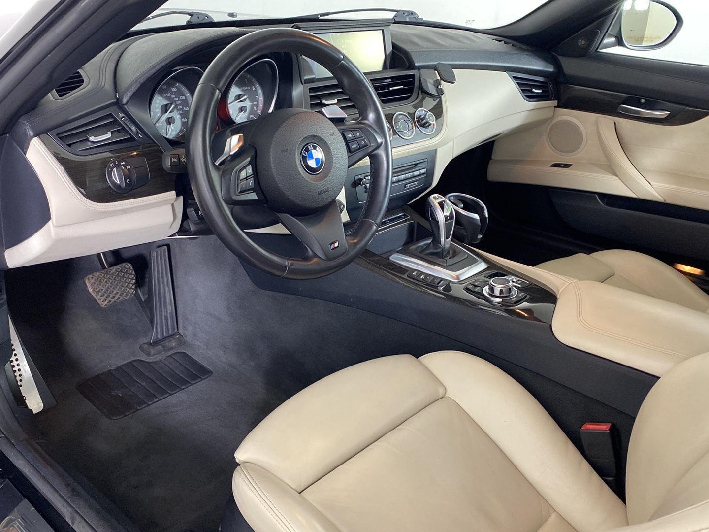 Used 2011 Black Sapphire Metallic BMW sDrive35is image 2