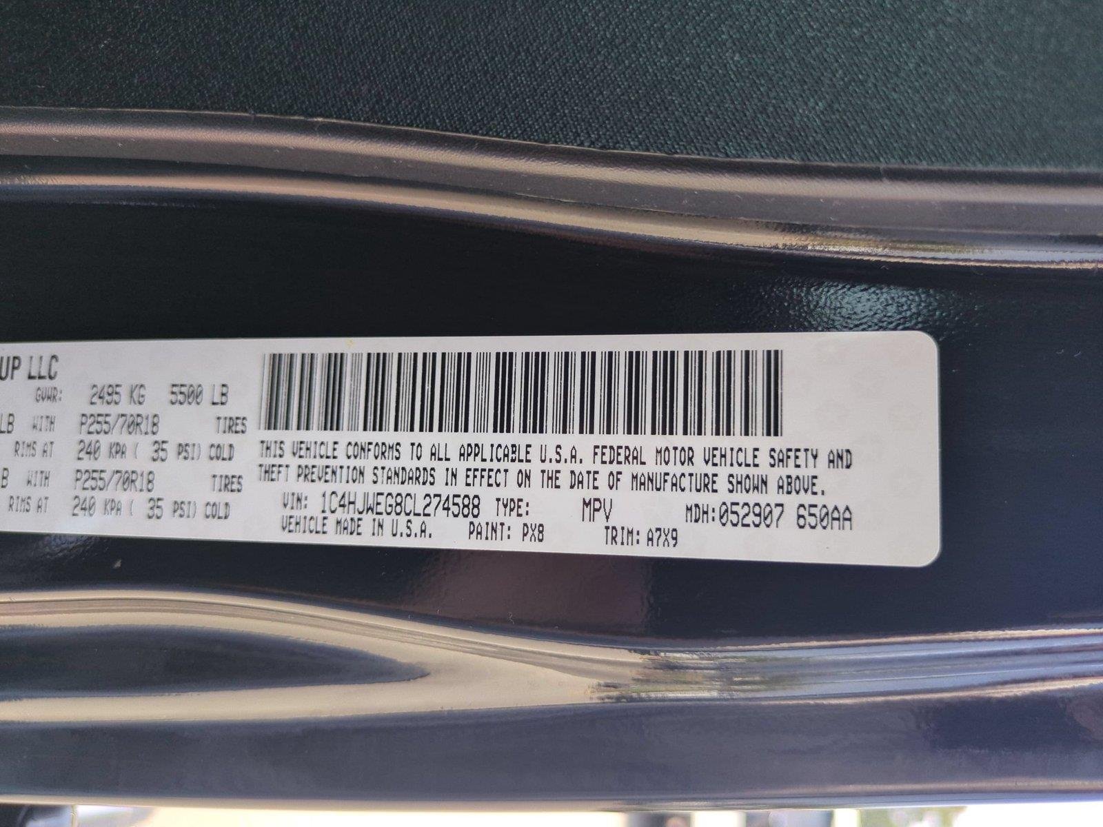Used 2012 Black Clearcoat Jeep Sahara image 35