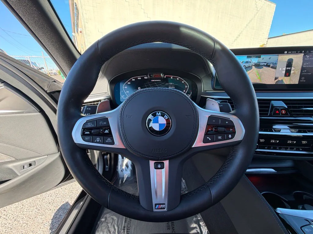 Used 2023 Black BMW M550i xDrive image 28