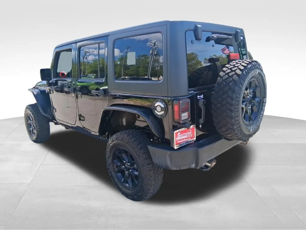 Used 2016 Black Jeep Unlimited Sport image 3