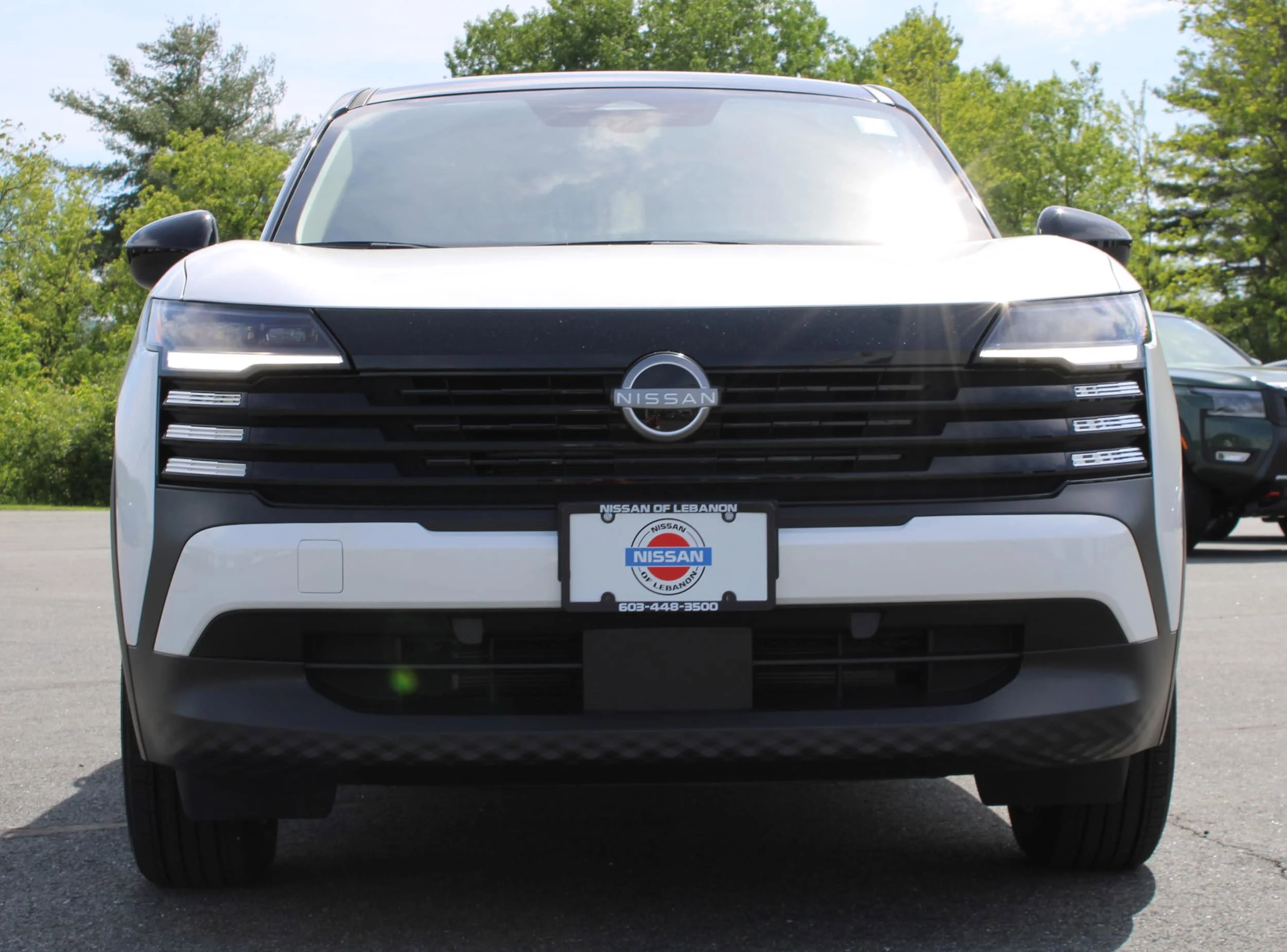 Used 2025 Aspen White Tricoat/Super Black Nissan SV image 2