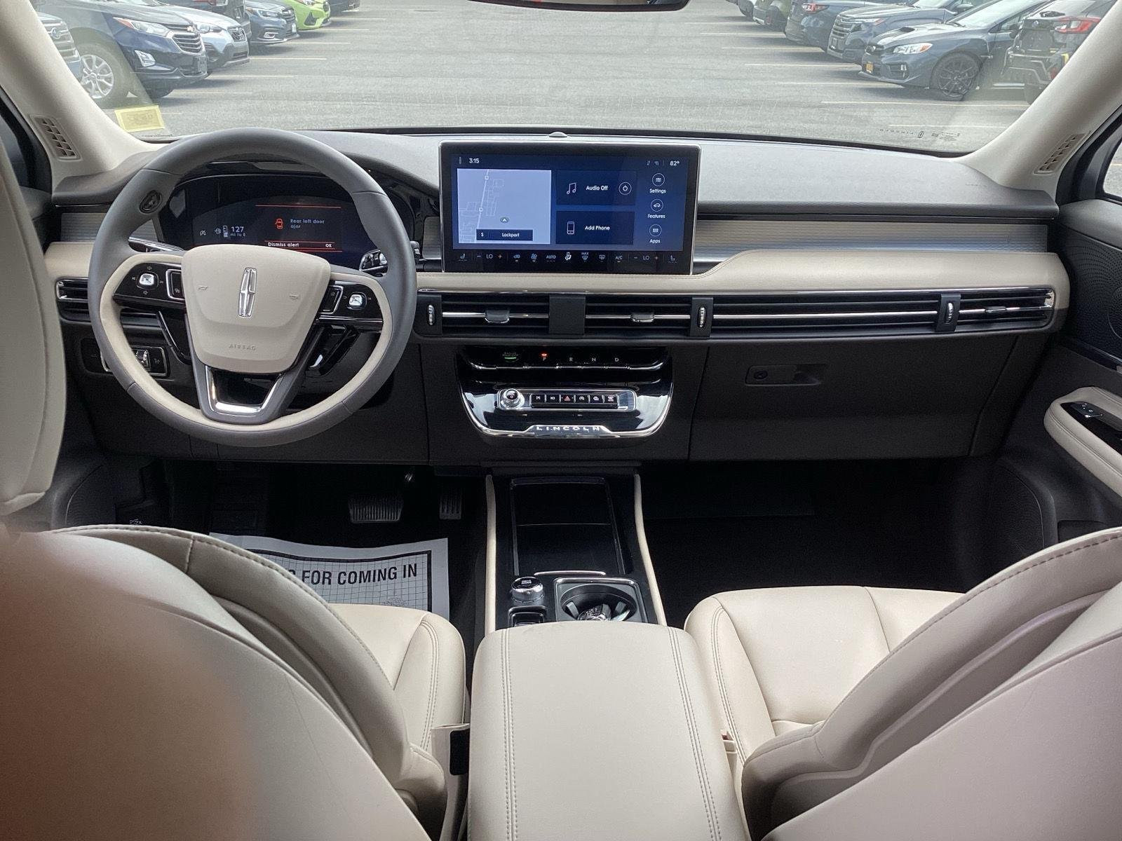 Used 2024 Pristine White Metallic Tri-Coat Lincoln Premiere image 14