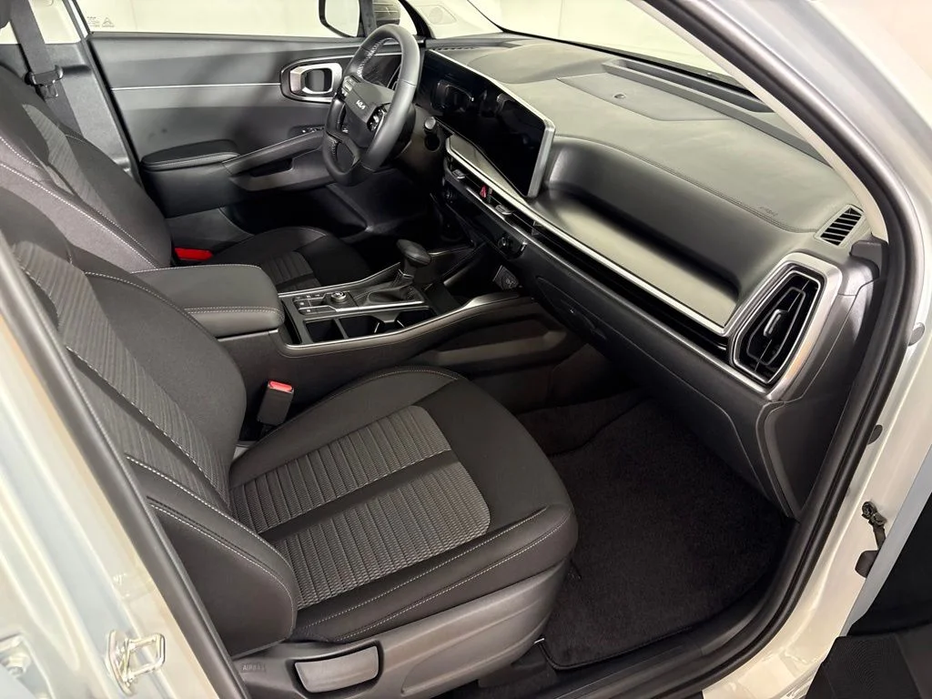 New 2026 Ivory Silver Kia LX image 16