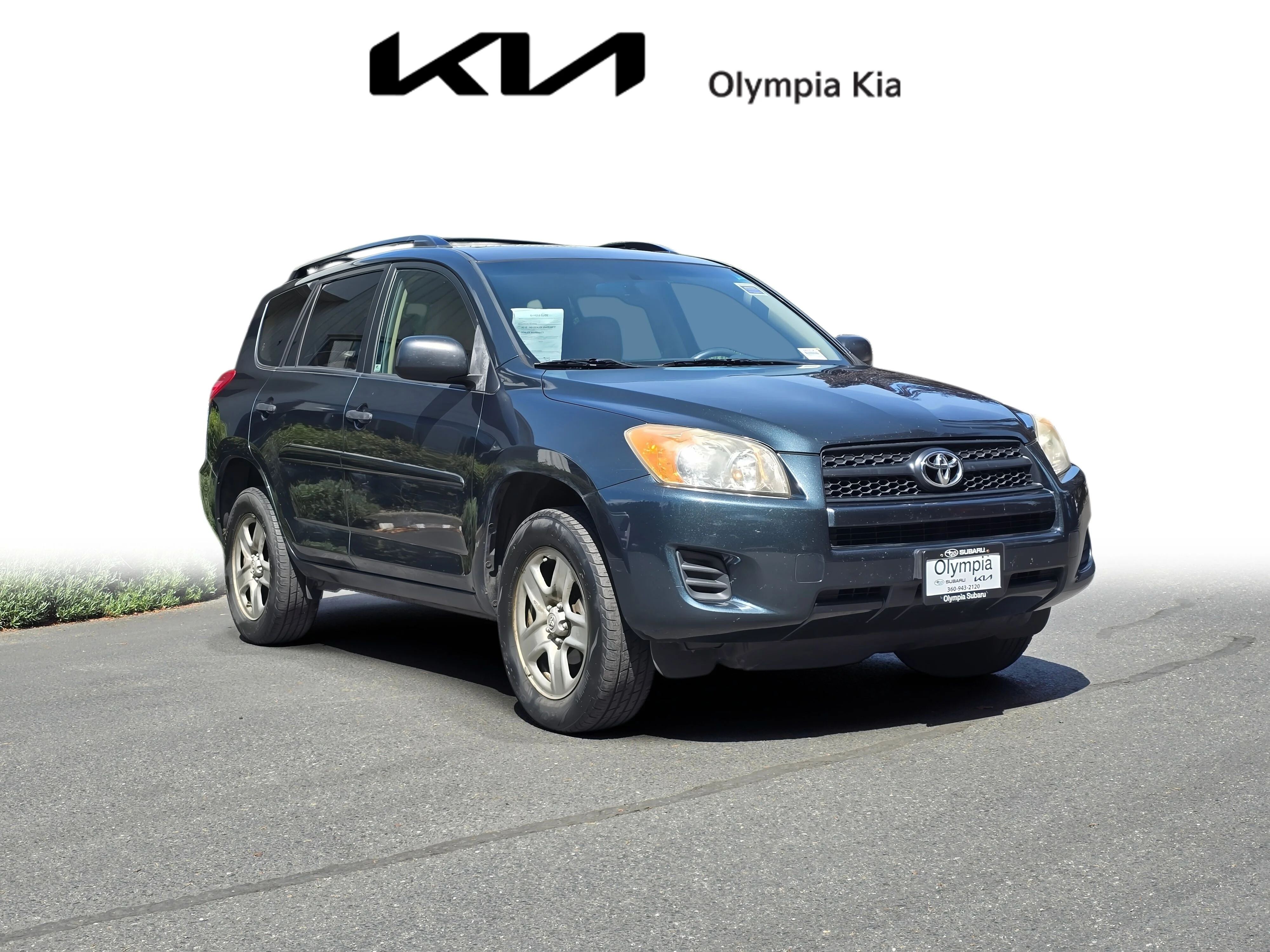 Used 2010 Black Forest Pearl Toyota Base image 1