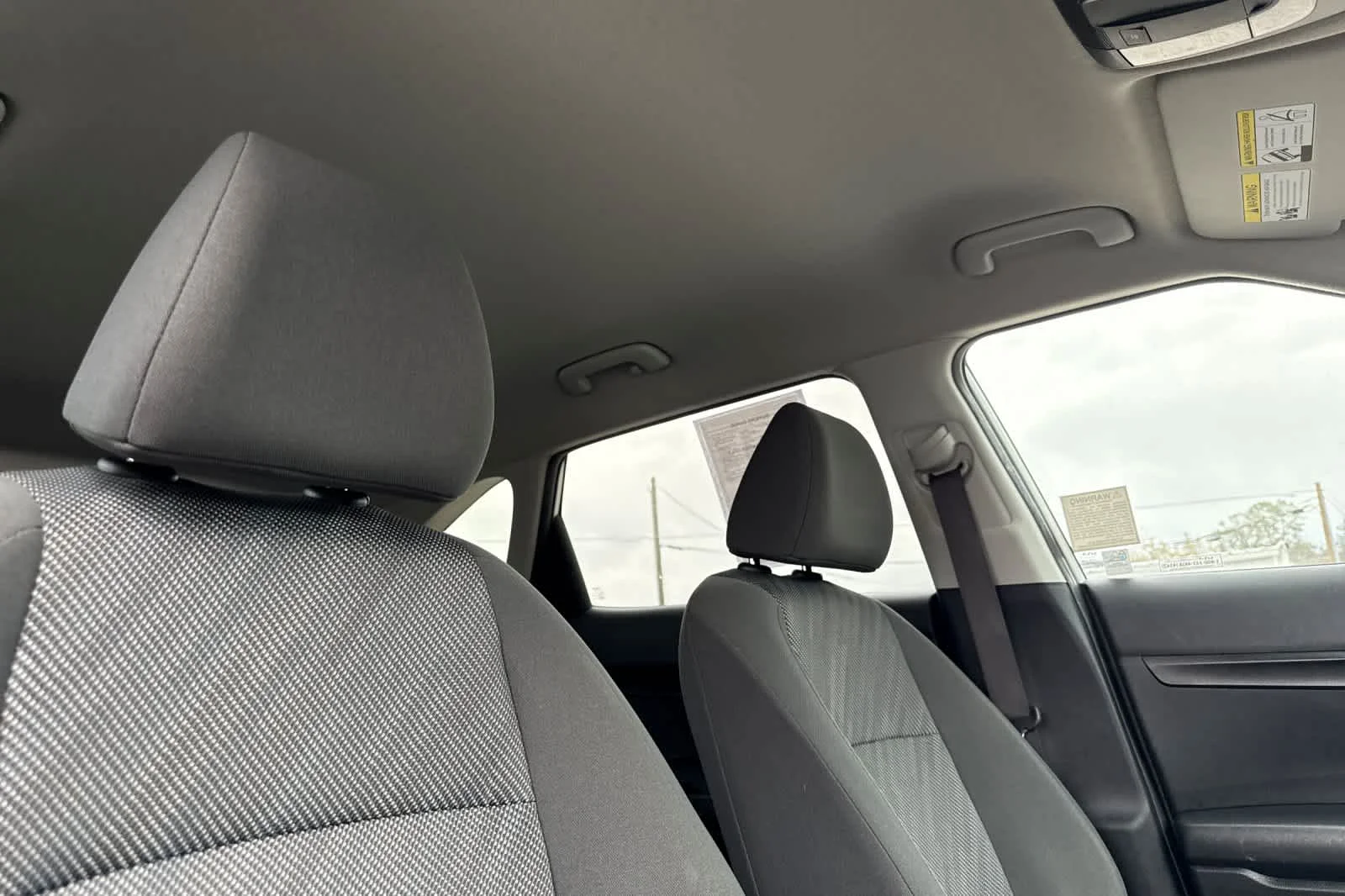 Used 2024 Snow White Pearl Kia LX image 18