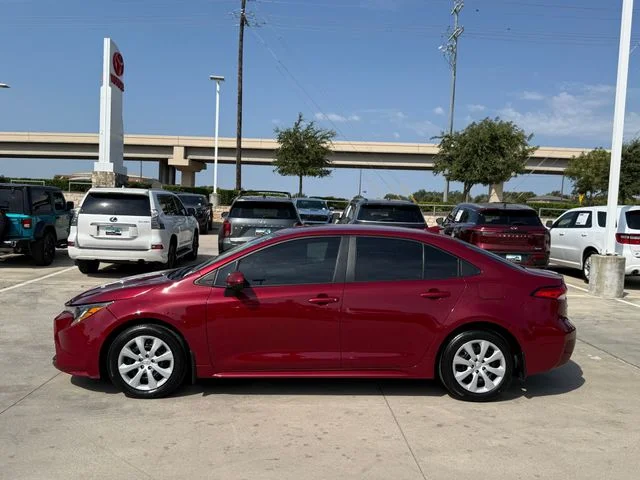 Certified Used 2024 RUBY FLARE PEARL Toyota LE image 9