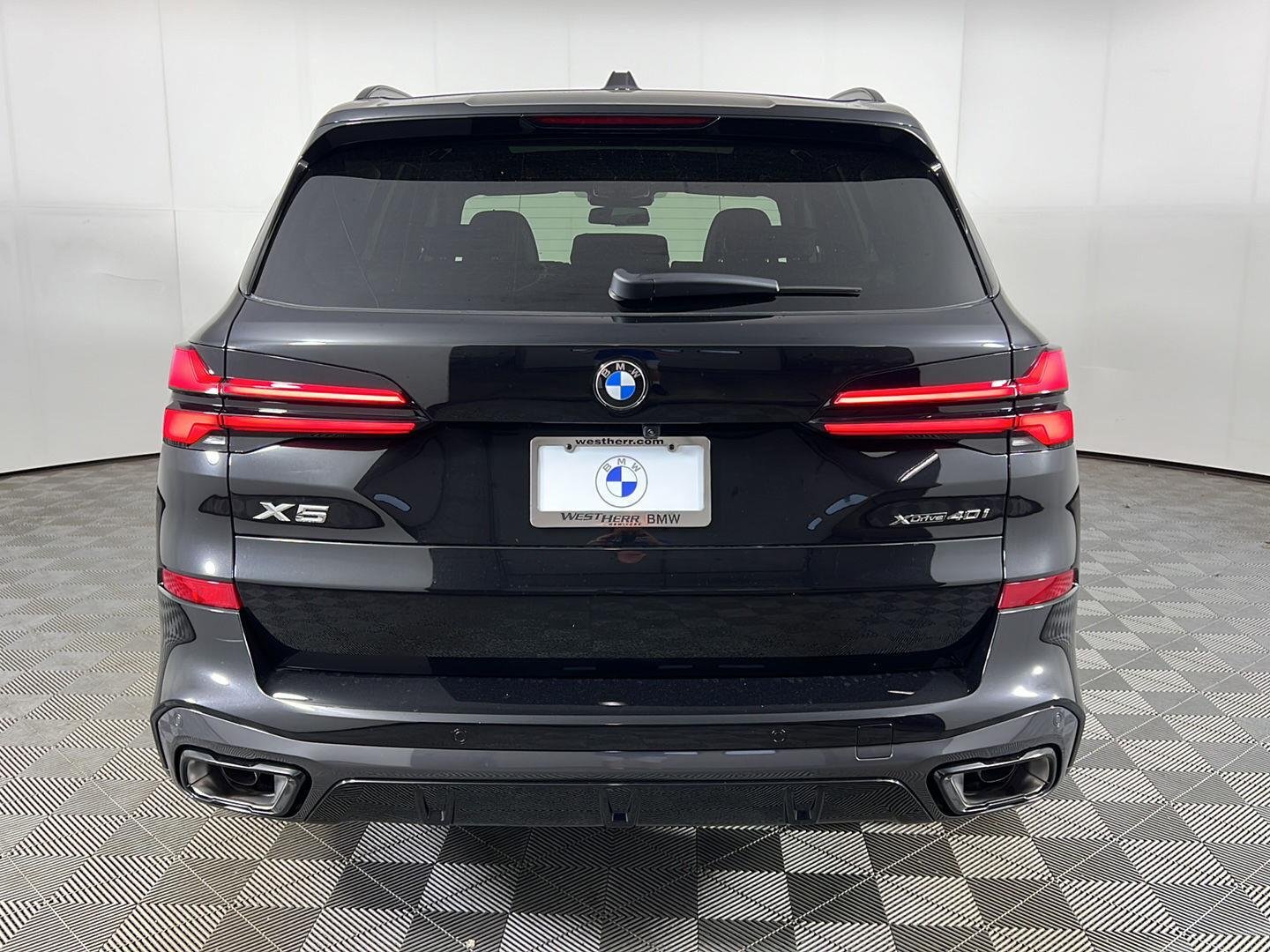 New 2026 Black Sapphire Metallic BMW xDrive40i image 16
