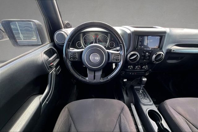 Used 2013 Black Jeep Unlimited Sport image 3