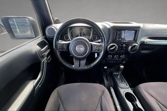 Used 2013 Black Jeep Unlimited Sport image 3