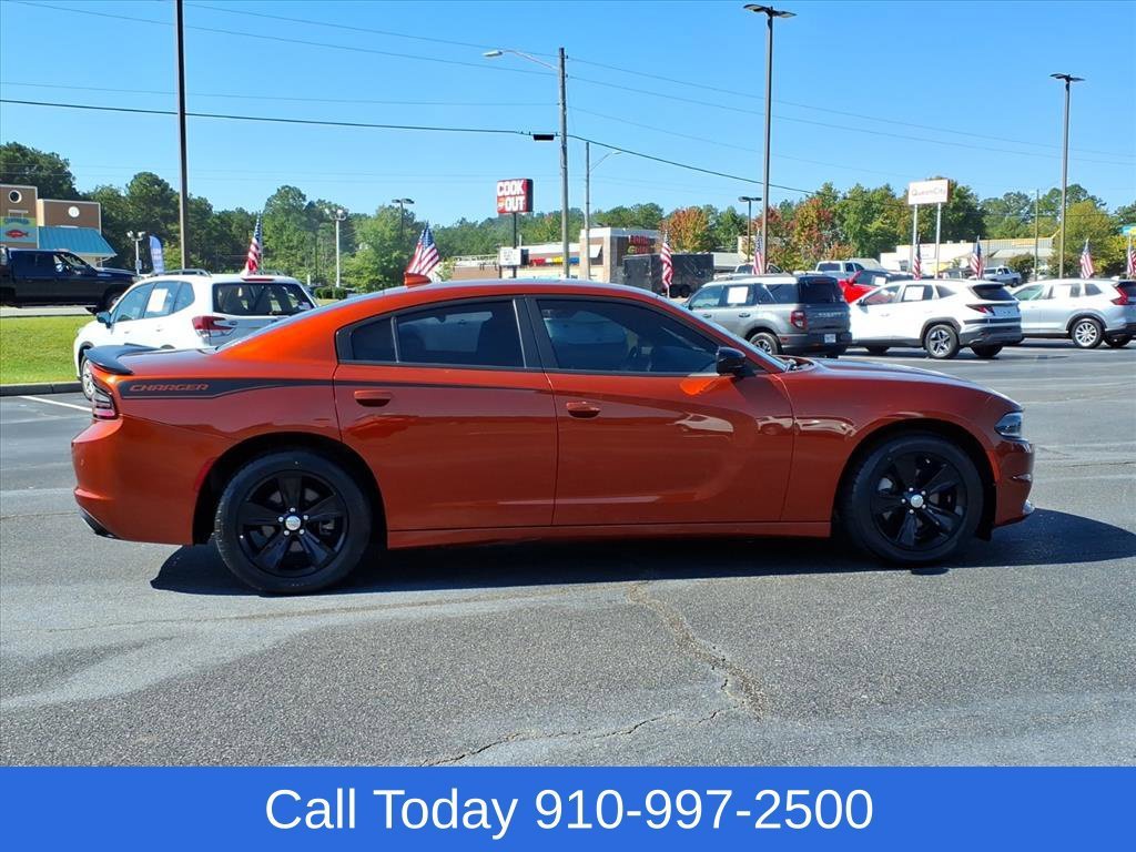 Used 2023 Orange Dodge SXT image 6