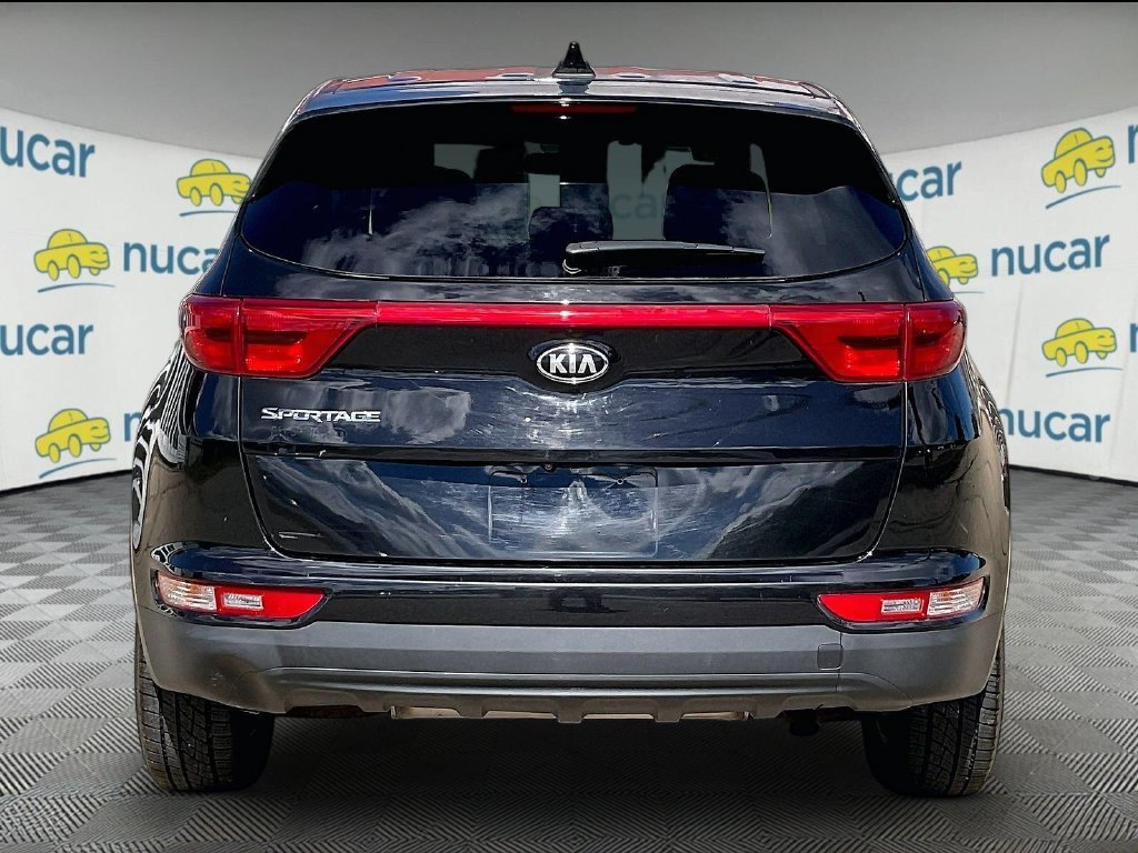 Used 2018 Black Cherry Kia LX image 5