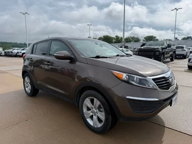 Used 2013 Brown Kia LX image 1