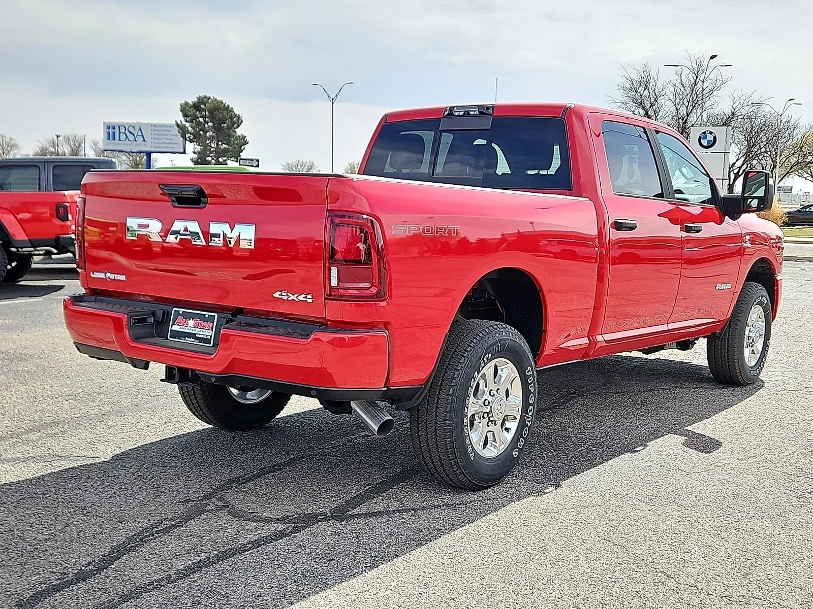 New 2026 Flame Red Ram LONE STAR CREW CAB 4X4 6
