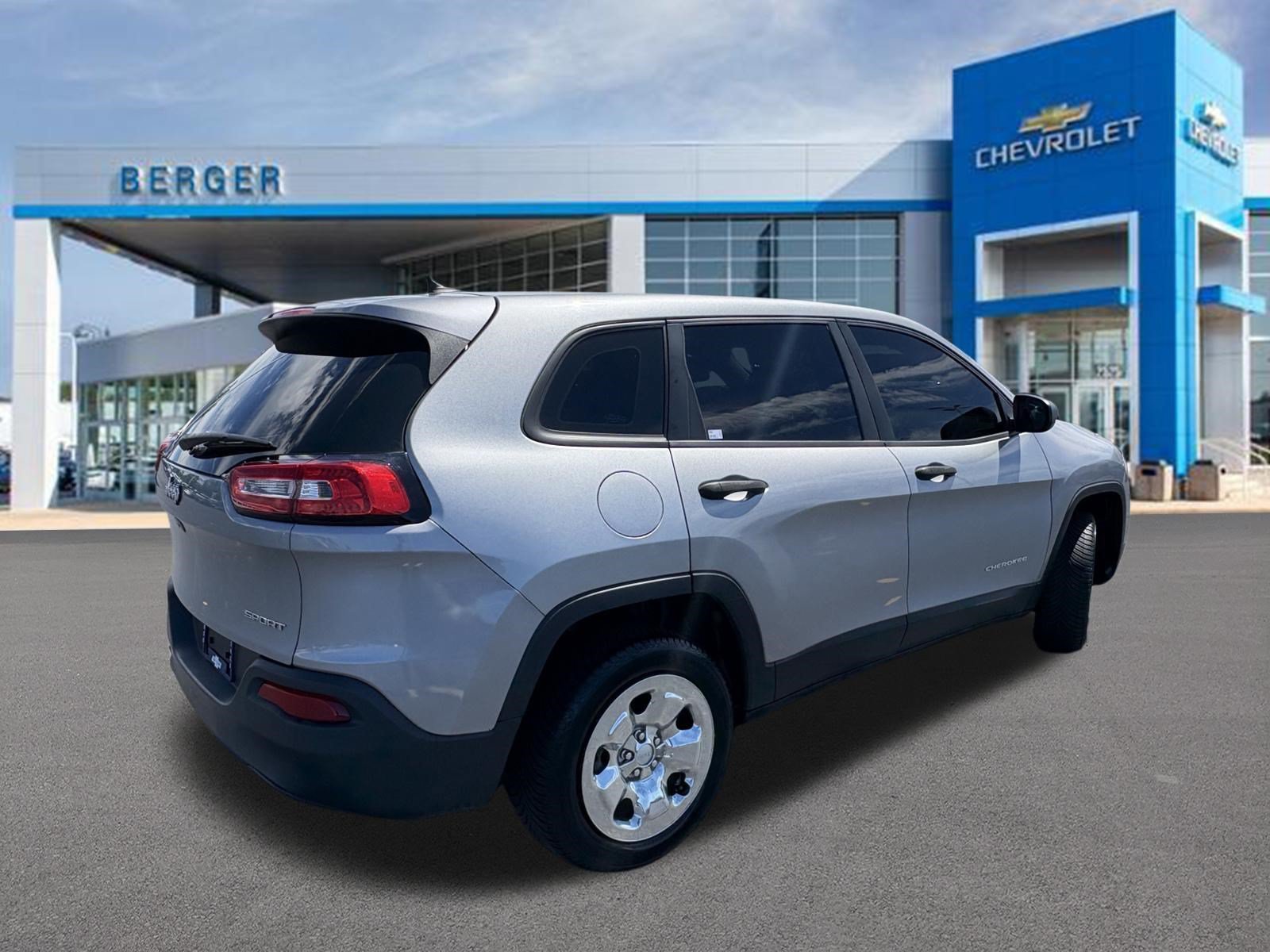 Used 2015 Jeep Cherokee Sport with VIN 1C4PJLABXFW560871 for sale in Grand Rapids, MI