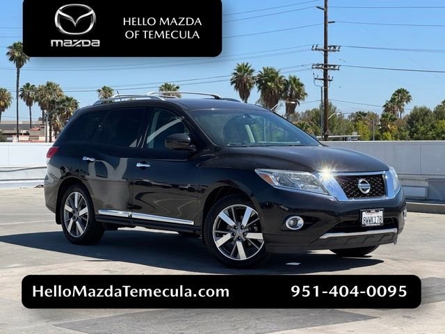 Used 2016 Magnetic Black Nissan Platinum image 1