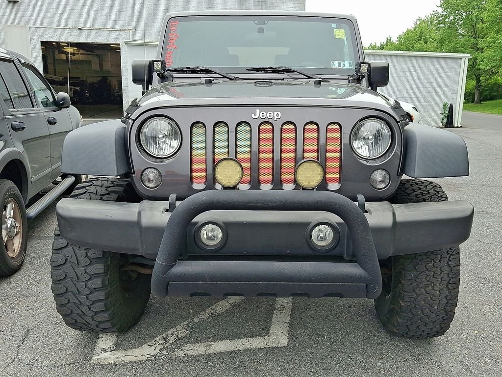 Used 2016 Gray Jeep Sport image 2