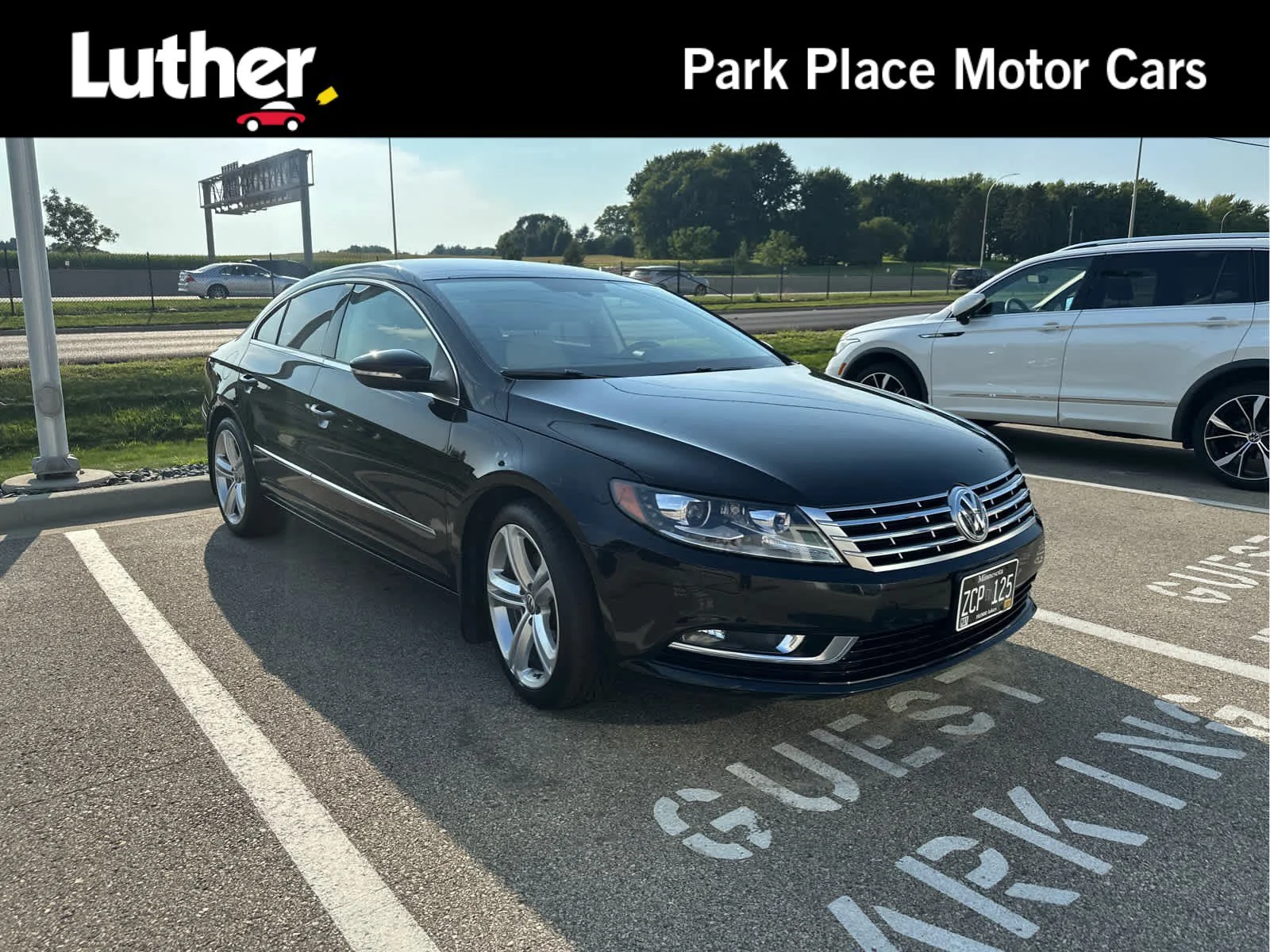 Used 2013 Deep Black Metallic Volkswagen Sport Plus image 1