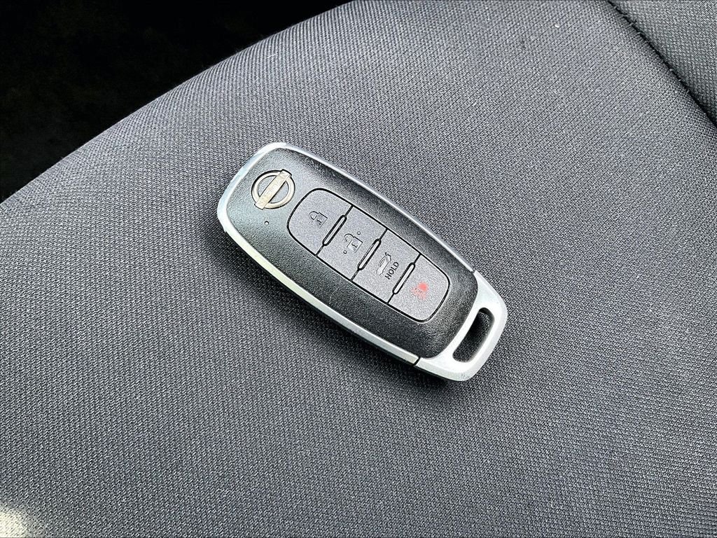 Certified Used 2024 White Nissan SV image 28